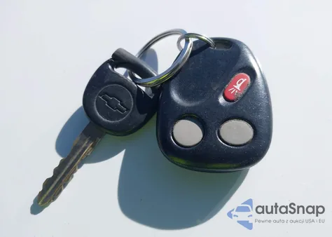 2005 Chevrolet Suburban 1500 Z71 z USA, uszkodzony, nr VIN 3GNEC16Z95G288863